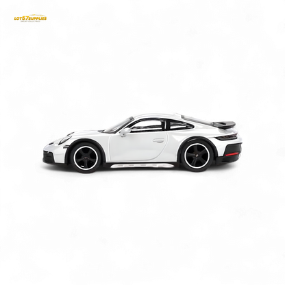 Mini-GT Porsche 911 Dakar diecast model in ice gray metallic, 1:64 scale, detailed Porsche collectible car.