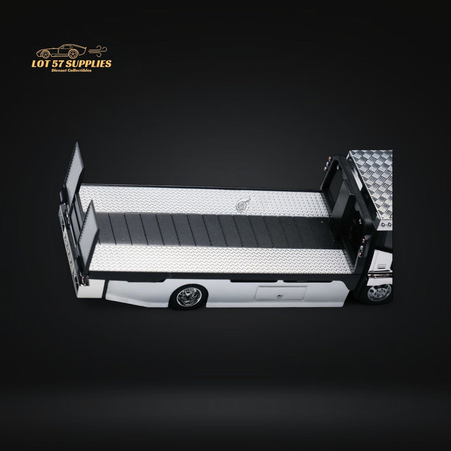 Detailed 1:64 scale MicroTurbo Dekotora flatbed tow truck in vibrant colors, featuring intricate design and realistic features.