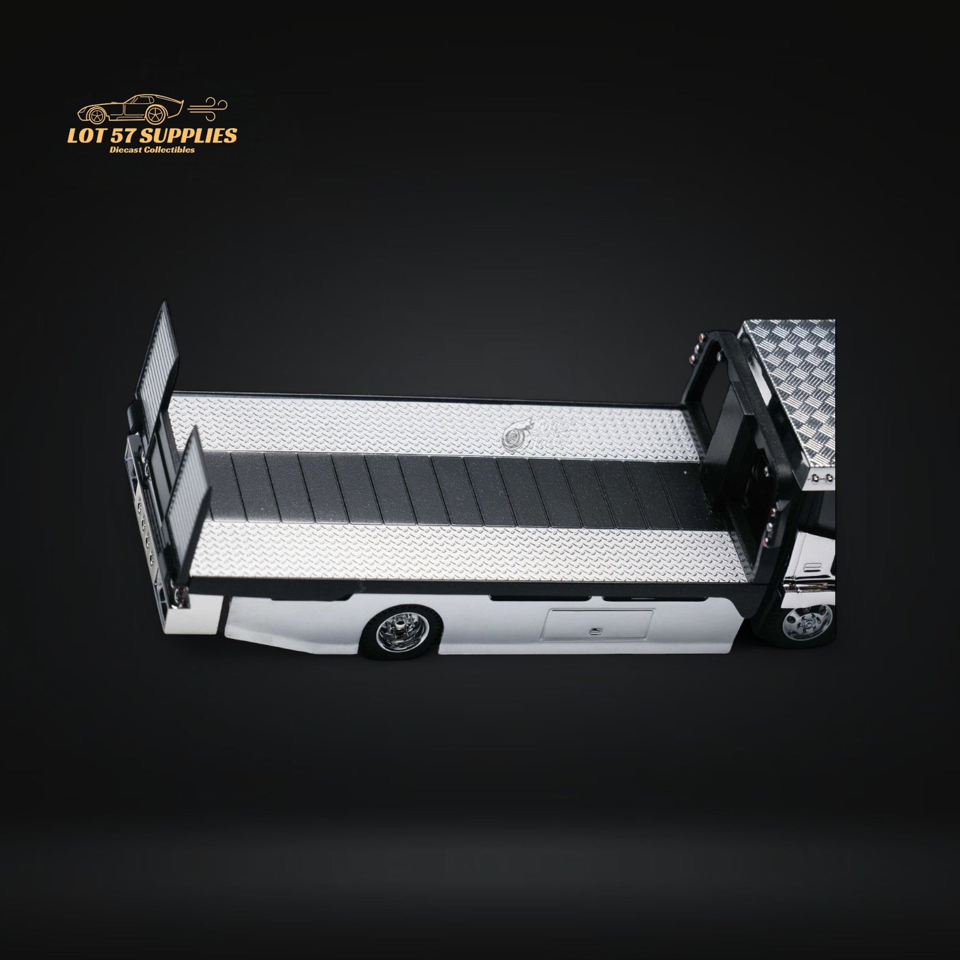 Detailed 1:64 scale MicroTurbo Dekotora flatbed tow truck in vibrant colors, featuring intricate design and realistic features.