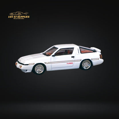 White Mitsubishi Starion diecast model in 1:64 scale by Tarmac Works, showing detailed exterior and compact design.