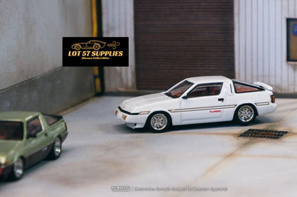 White Mitsubishi Starion diecast model in 1:64 scale by Tarmac Works, detailed miniature car with sleek design.