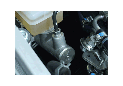 Black Perrin master cylinder brace for 2015-2021 Subaru WRX and STI, mounted on engine bay with visible mounting points.