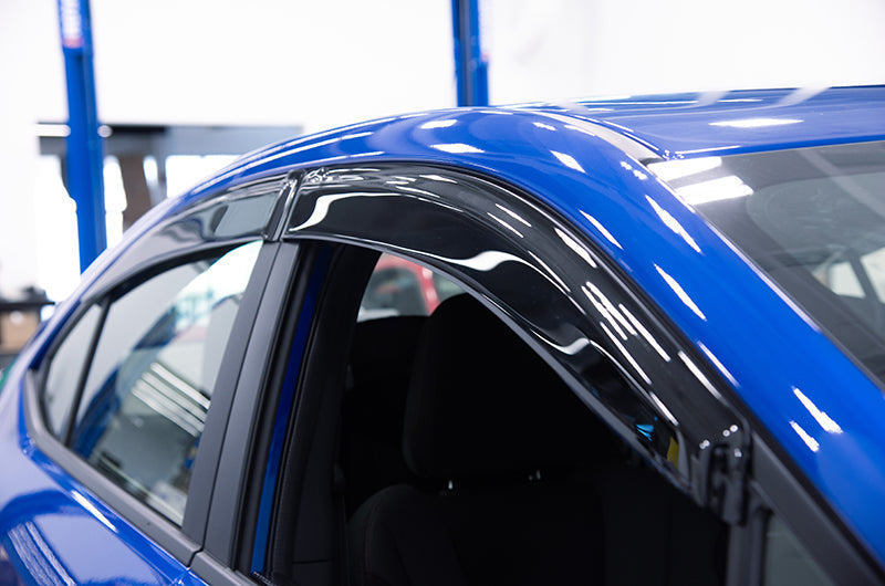OLM Rain Guards for 2022+ Subaru WRX, exterior accessories, weather-resistant window visor for side windows, black finish.