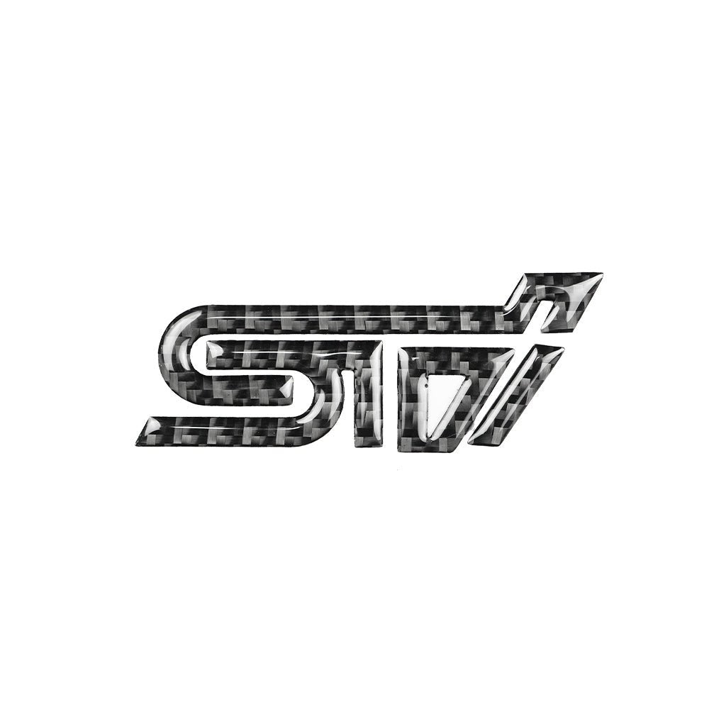Carbon fiber STI trunk emblem by Racing Art, JDMuscle, designed as a stylish ornament for Subaru vehicles.