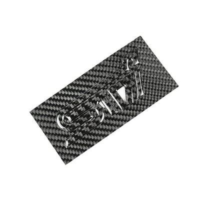 JDMuscle Racing Art Carbon Fiber STI trunk emblem, a sleek automotive ornament with a black carbon fiber finish.