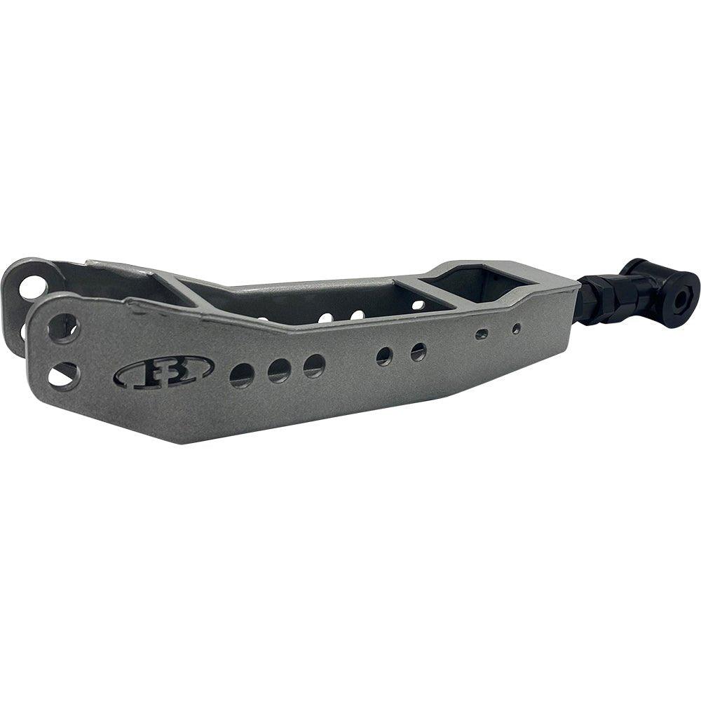 BLOX Racing rear lower control arms for 86, FR-S, BRZ, WRX, and STi suspension, shown in a close-up shot.