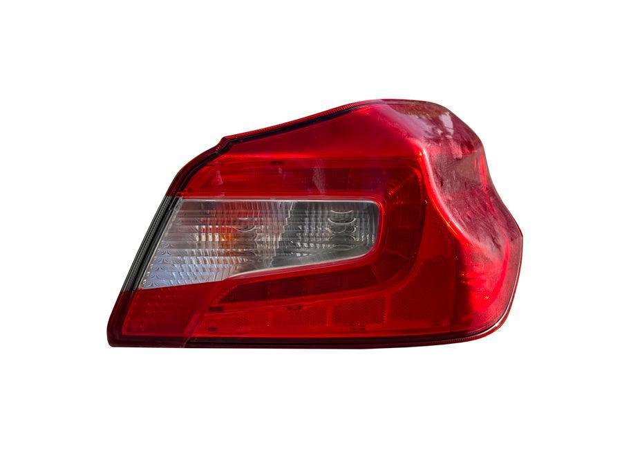 Red facelift 1.5 tail light overlays for 2015-2021 Subaru WRX and STI by StickerFab, showing installed taillight accents.