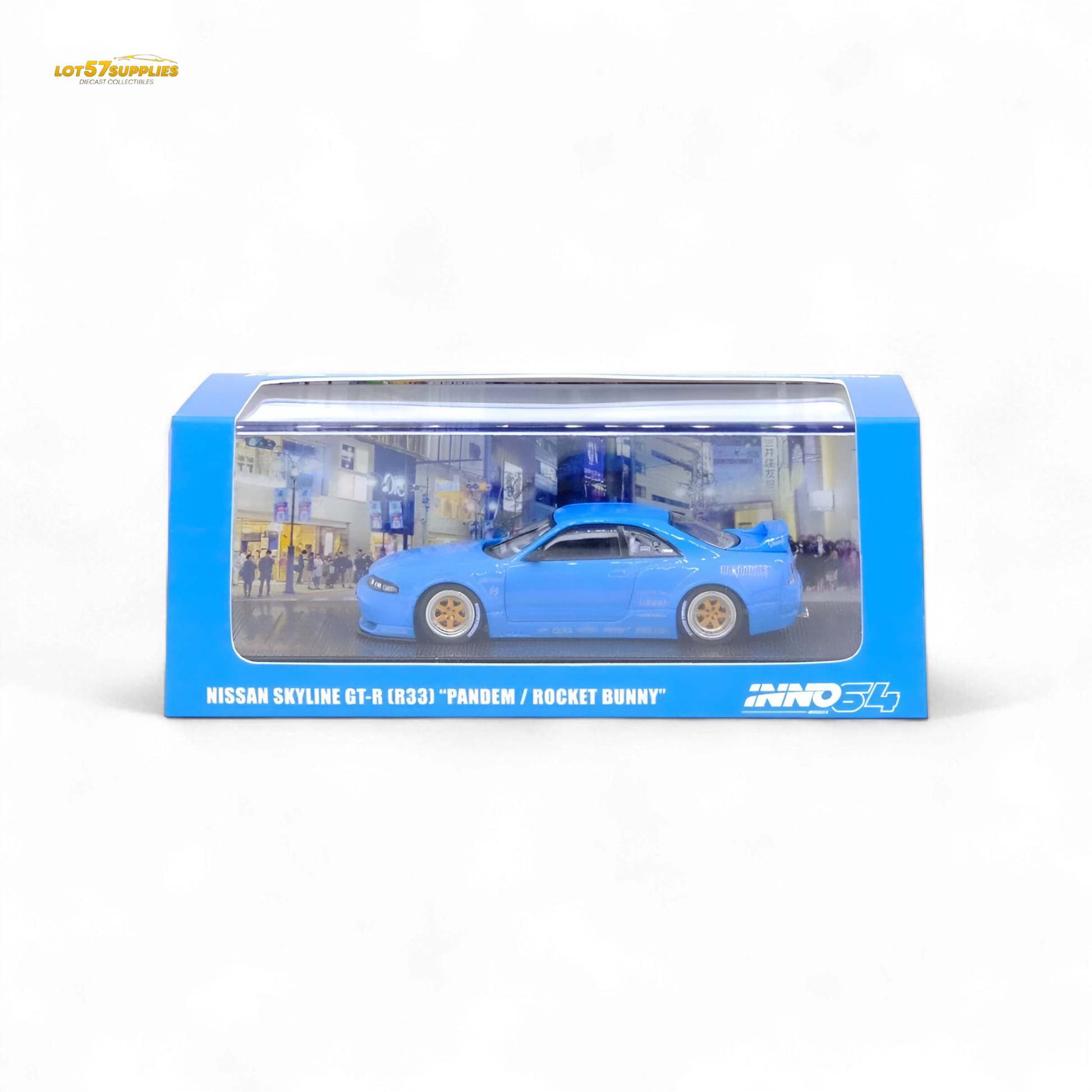 Blue 1:64 scale Inno64 Nissan Skyline GT-R R33 Pandem Rocket Bunny diecast car, detailed model with vibrant blue finish.