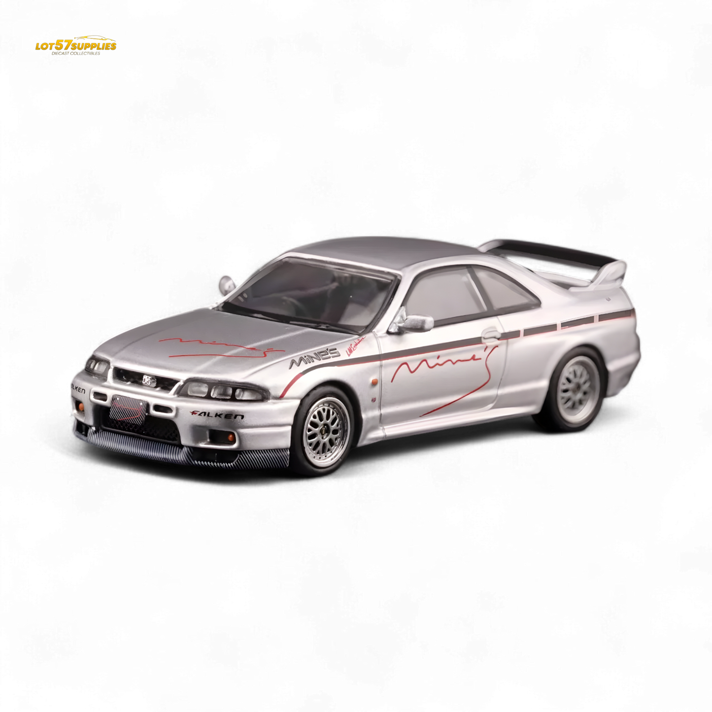 Silver Inno64 Nissan Skyline GT-R R33 diecast model, "Tuned by Mine's," detailed view showcasing its sleek design and branding.