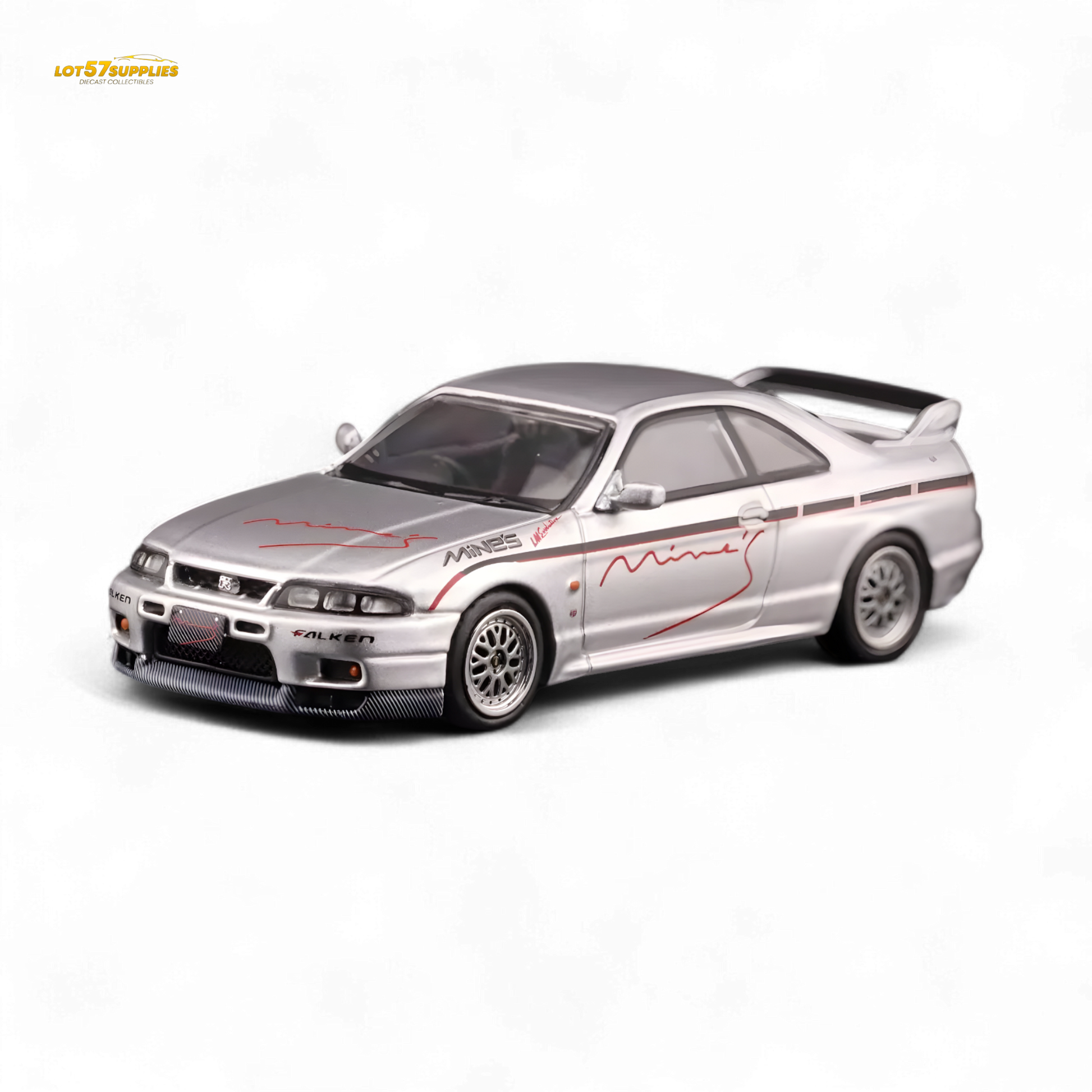 Silver Inno64 Nissan Skyline GT-R R33 diecast model, "Tuned by Mine's," detailed view showcasing its sleek design and branding.