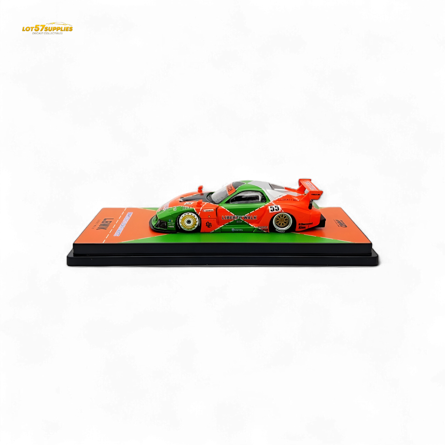 Orange and green Inno64 Mazda RX-7 LBWK diecast model in 1:64 scale with detailed exterior features.