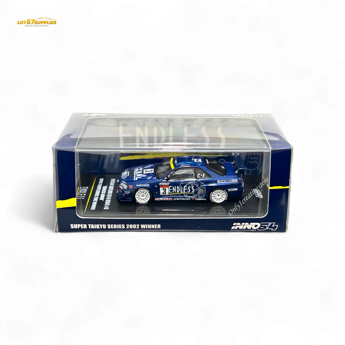Detail of Inno64 Nissan Skyline GT-R R34 diecast model in #3 Endless Advan livery, showcasing the blue and white Nissan sports car.