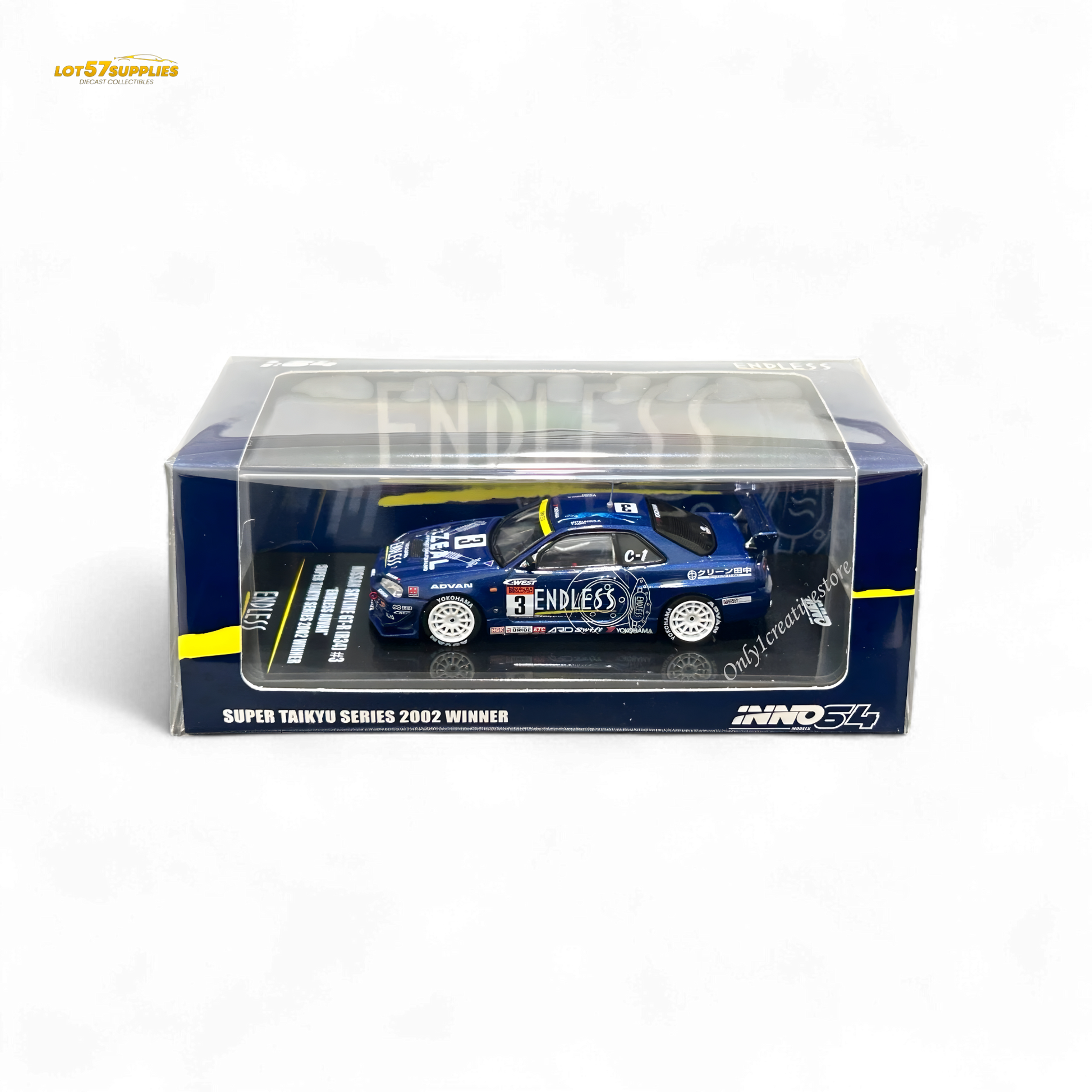 Detail of Inno64 Nissan Skyline GT-R R34 diecast model in #3 Endless Advan livery, showcasing the blue and white Nissan sports car.