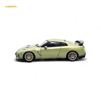Nissan Skyline GT-R R35 diecast model in Millennium Jade color, 1:64 scale by Inno64, detailed miniature car on white background