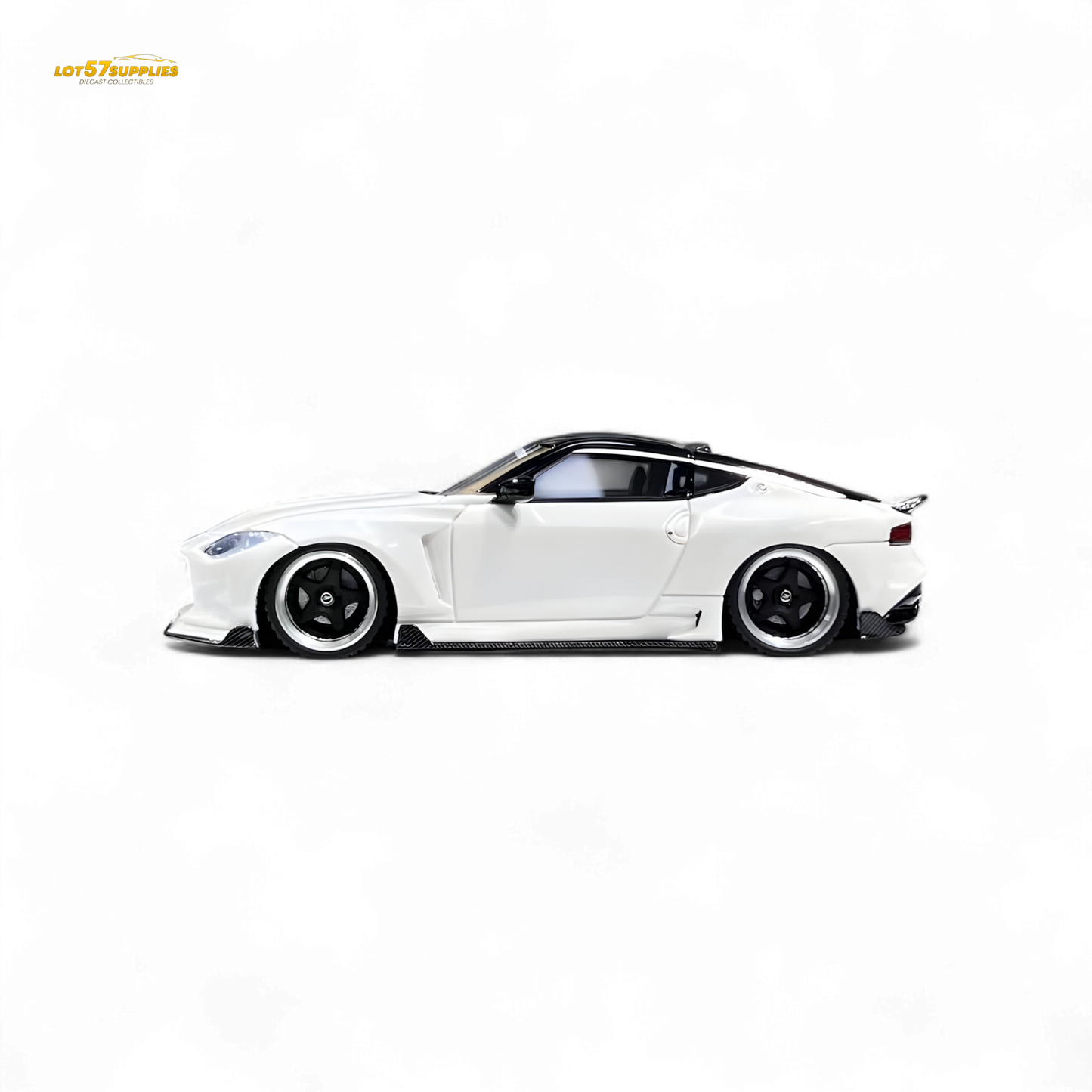 White Nissan 400Z diecast model car in 1:64 scale by Lot57Supplies Diecast Shop, detailed miniature vehicle with Nissan branding.
