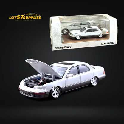 White and gray 1:64 scale Lexus LS400 diecast model with double stance, detailed features, by Lot57Supplies Diecast Shop.