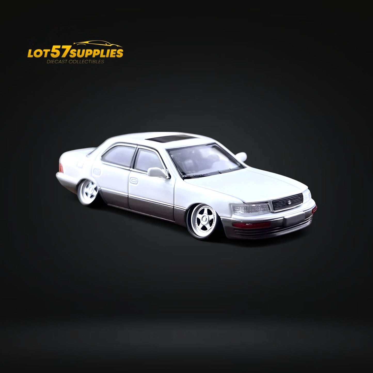 White and gray 1:64 scale Lexus LS400 diecast model with double stance, detailed features, from Lot57Supplies Diecast Shop.