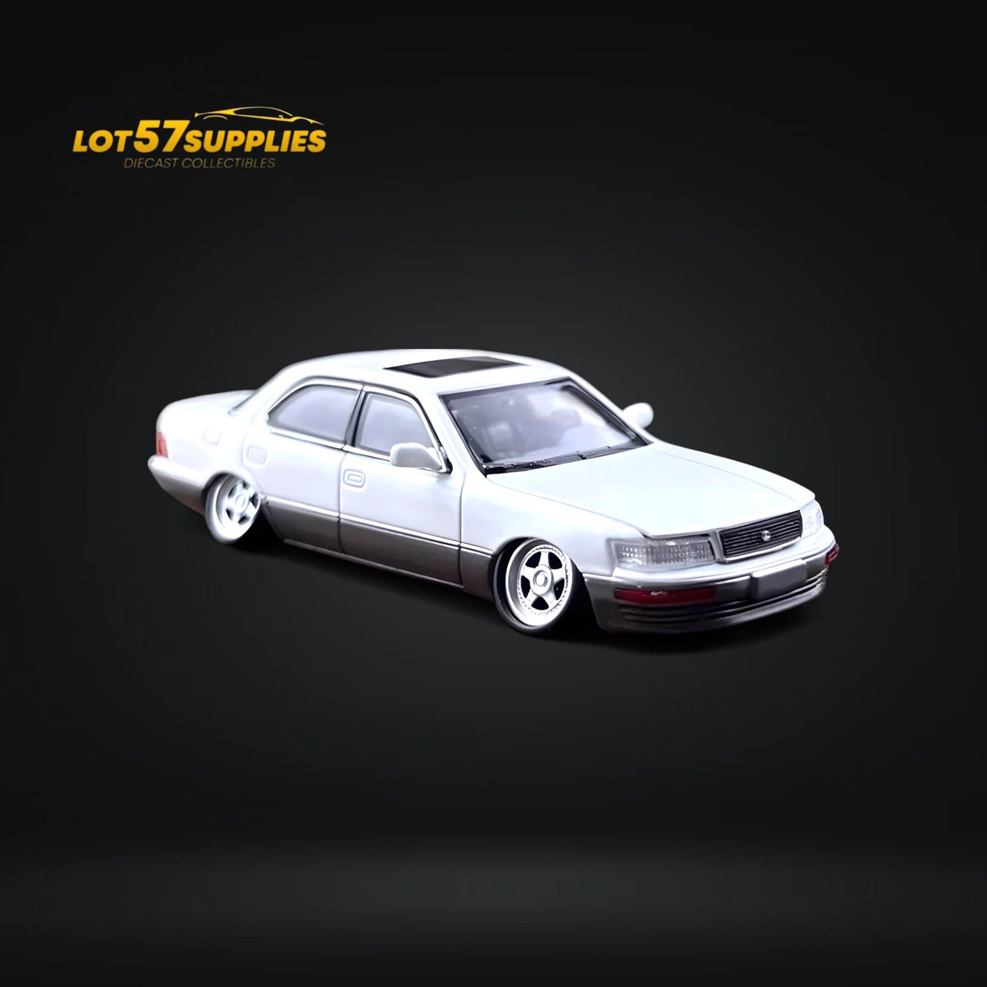 White and gray 1:64 scale Lexus LS400 diecast model with double stance, detailed features, from Lot57Supplies Diecast Shop.
