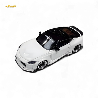 White Nissan 400Z diecast model car in 1:64 scale from Lot57Supplies Diecast Shop, detailed miniature collectible.
