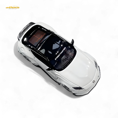 White Nissan 400Z diecast model in 1:64 scale by Lot57Supplies Diecast Shop, detailed miniature car with Nissan branding.