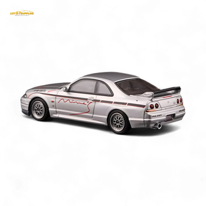 Silver Inno64 Nissan Skyline GT-R R33 diecast model, tuned by Mine's, detailed 1:64 scale Nissan car for collectors.