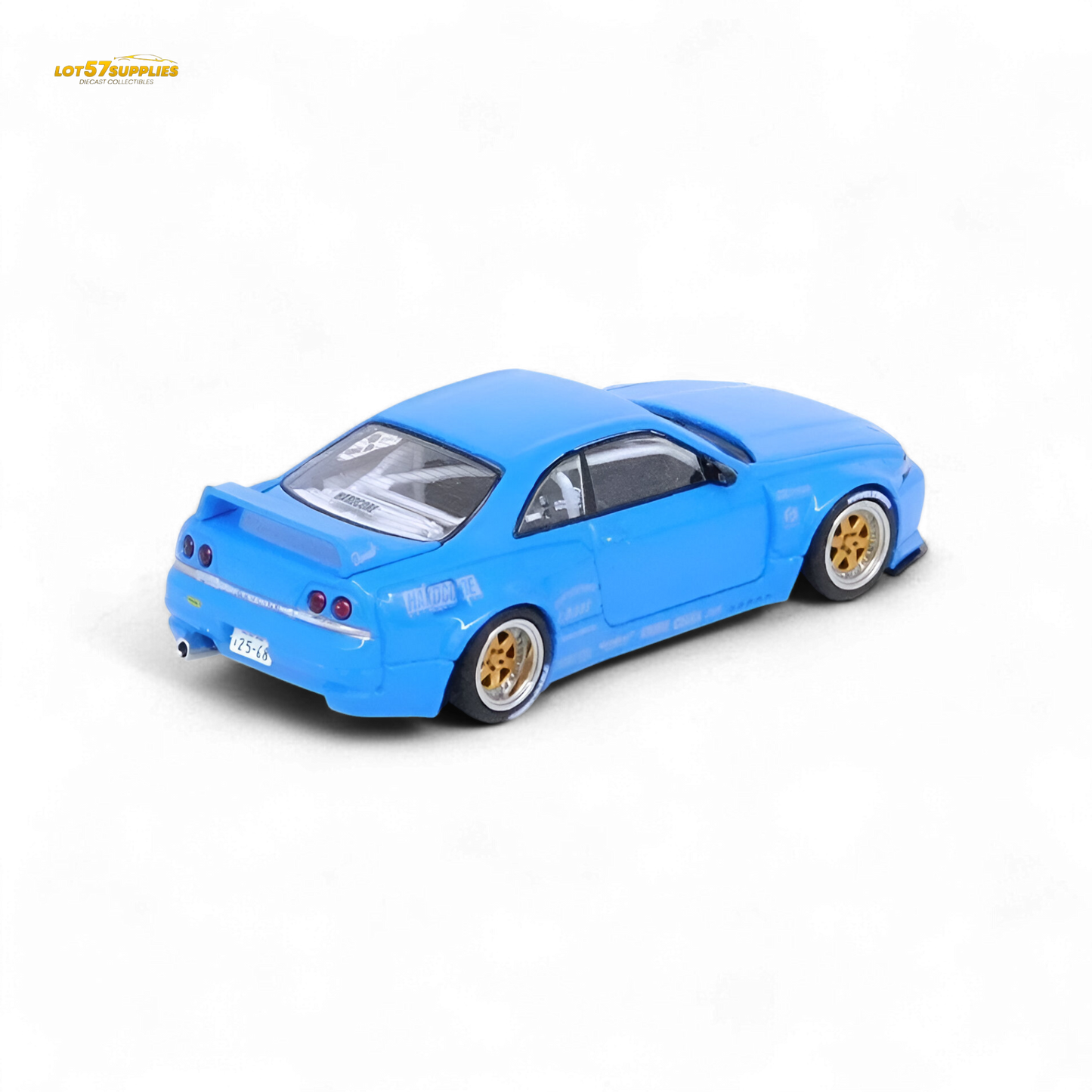 Blue Inno64 Nissan Skyline GT-R R33 diecast model with Pandem Rocket Bunny body kit, detailed miniature car on a white background.