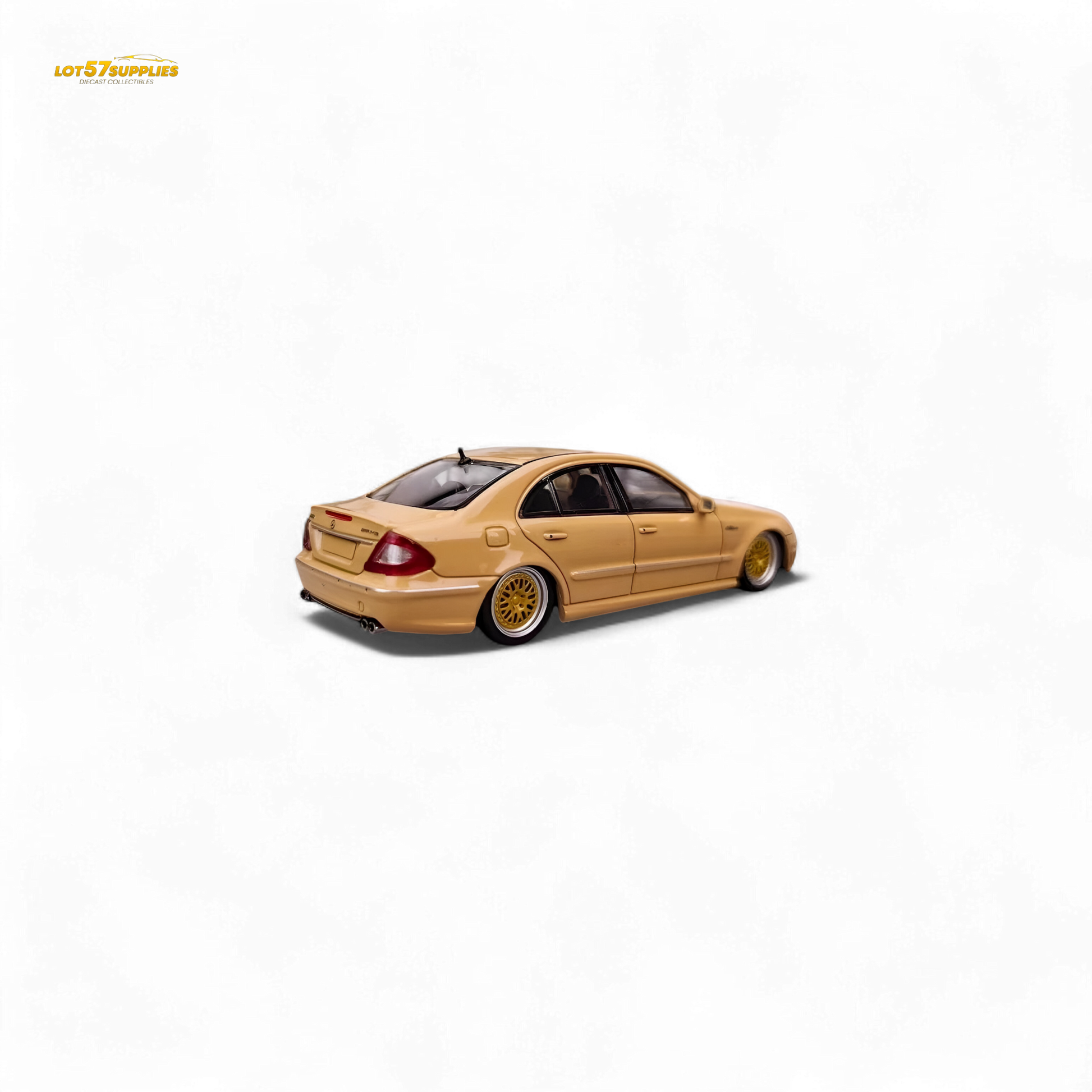 Desert yellow Mercedes-Benz E63 AMG W211 diecast model car in 1:64 scale by Lot57Supplies Diecast Shop, detailed and realistic.
