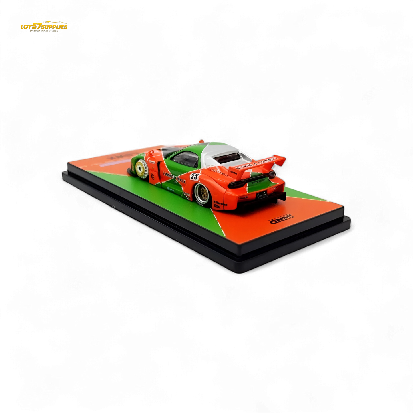 Orange and green Inno64 Mazda RX-7 LBWK diecast model, detailed 1:64 scale car with Mazda branding.