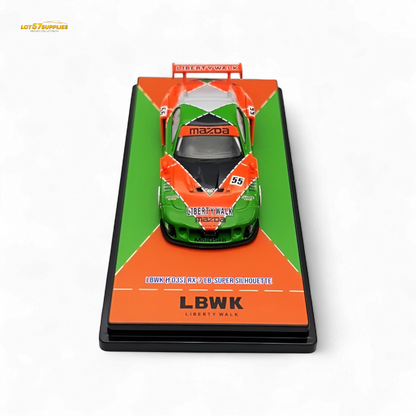 Orange and green Mazda RX-7 LBWK diecast model by Inno64, detailed 1:64 scale car with vibrant color accents.