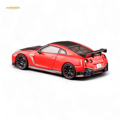 Red Inno64 Nissan GT-R R35 Nismo diecast car, detailed miniature model in 1:64 scale with sleek design and vibrant red finish.