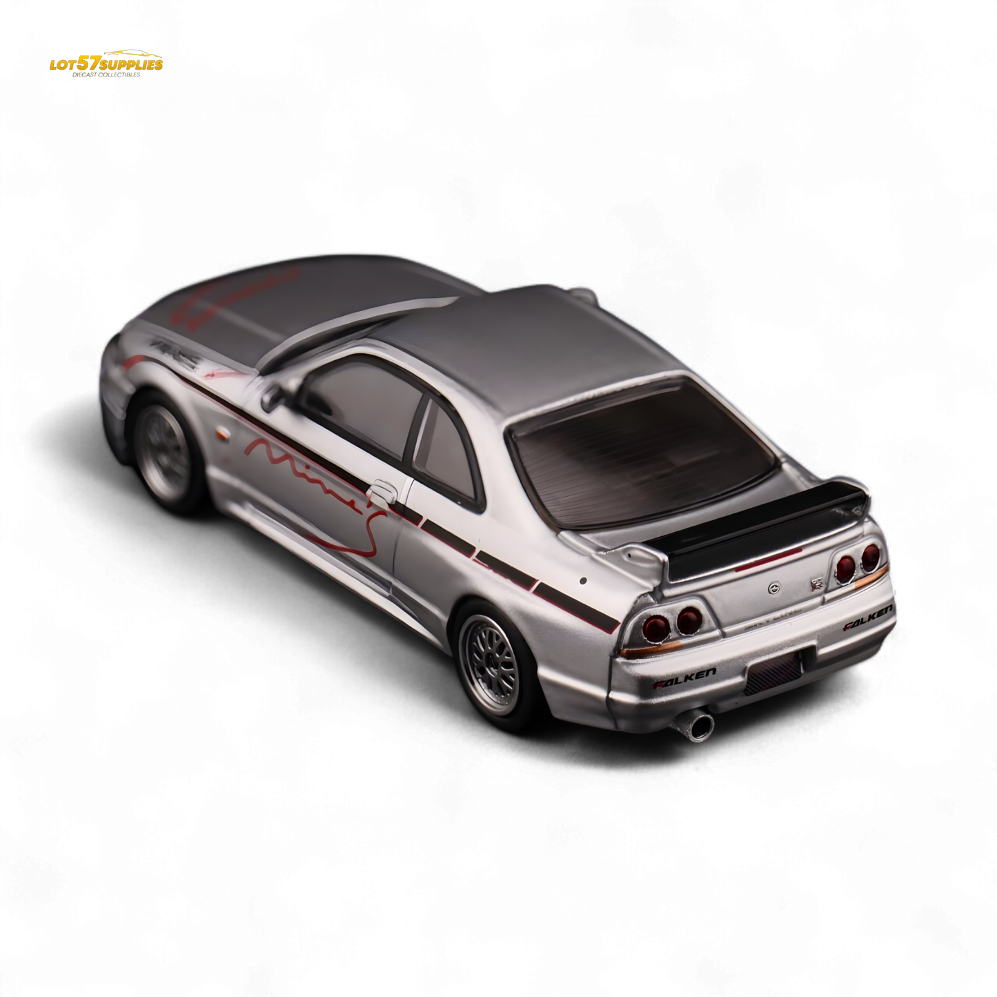 Silver Inno64 Nissan Skyline GT-R R33 diecast model by Lot57Supplies, featuring detailed "Tuned by Mine's" branding.