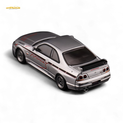 Silver Inno64 Nissan Skyline GT-R R33 diecast model by Lot57Supplies, featuring detailed "Tuned by Mine's" branding.
