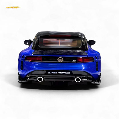 Candy blue 1:64 Nissan 400Z resin model car by Lot57Supplies Diecast Shop, detailed miniature collectible with realistic features.