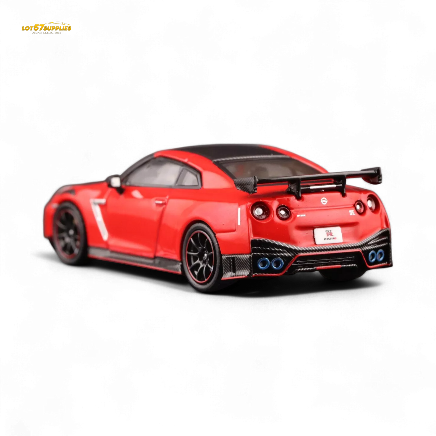 Red Inno64 Nissan GT-R R35 Nismo diecast model car, detailed 1:64 scale Nissan vehicle showcasing Nismo branding.