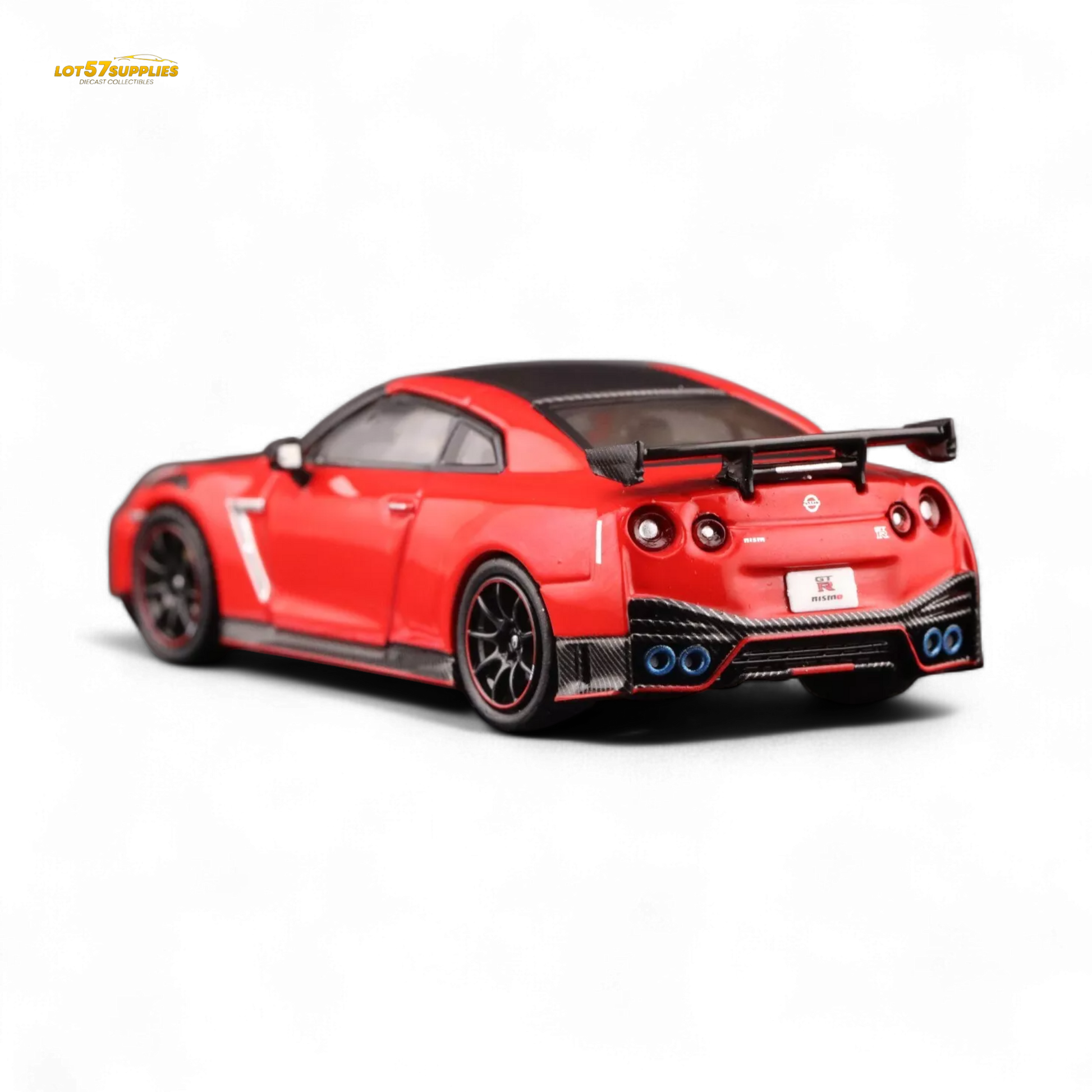 Red Inno64 Nissan GT-R R35 Nismo diecast model car, detailed 1:64 scale Nissan vehicle showcasing Nismo branding.