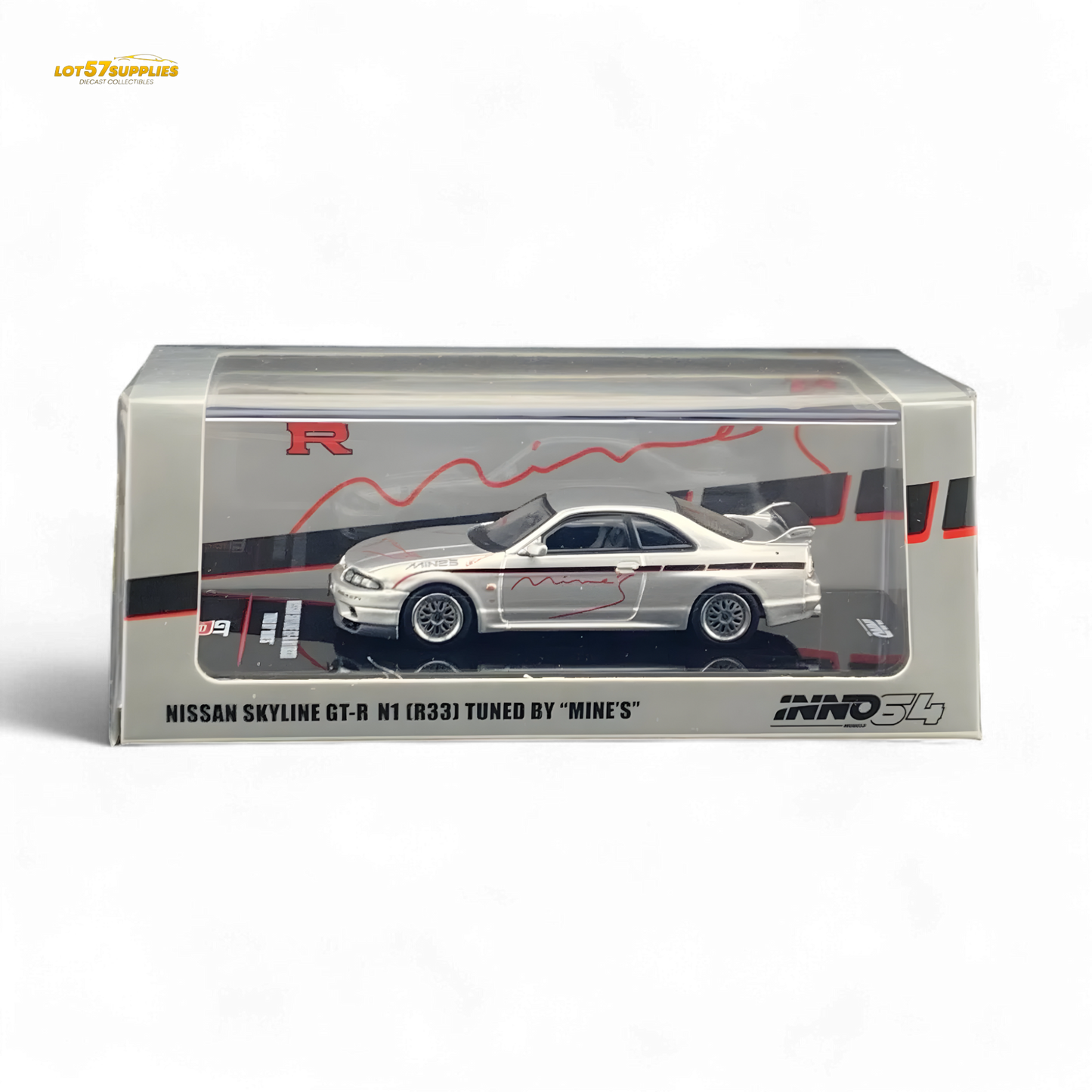 Silver Inno64 Nissan Skyline GT-R R33 diecast car tuned by Mine's, detailed scale model on a neutral background.