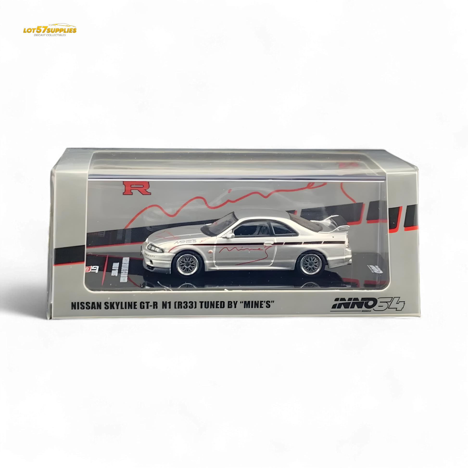 Silver Inno64 Nissan Skyline GT-R R33 diecast car tuned by Mine's, detailed scale model on a neutral background.