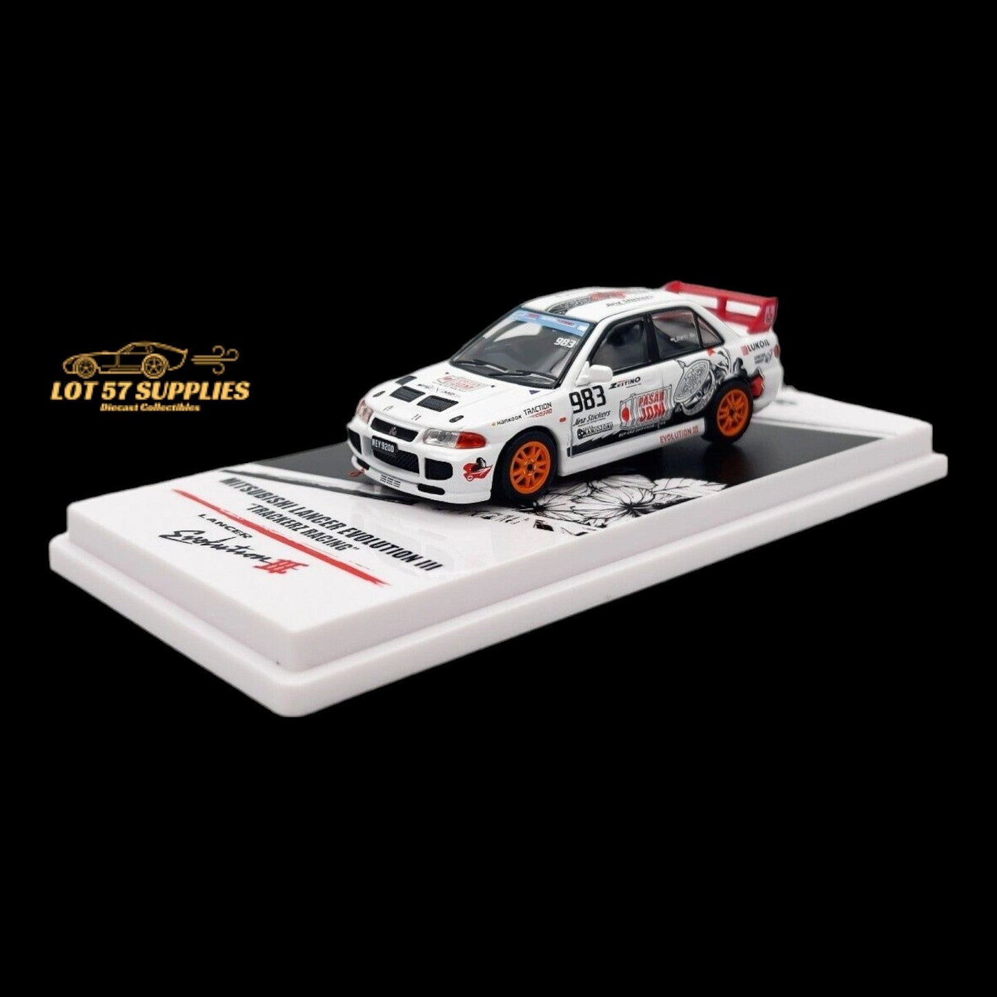 Miniature Mitsubishi Lancer Evo III diecast model by Inno64, detailed Trackerz Racing car in 1:64 scale.