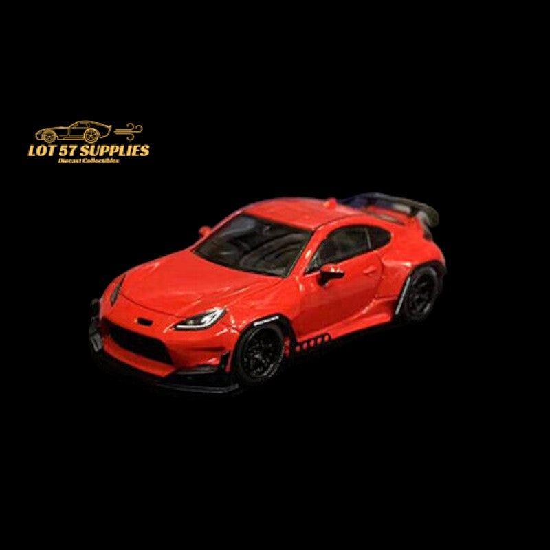 Red Toyota GR86 diecast model with Rocket Bunny Pandem body kit, 1:64 scale, featuring detailed design and vibrant paint.