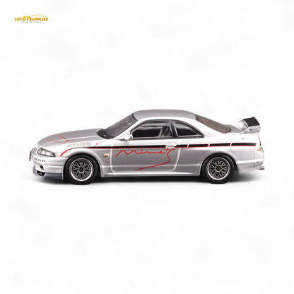 Silver Inno64 Nissan Skyline GT-R R33 diecast model tuned by Mine's, detailed 1:64 scale car with realistic features.