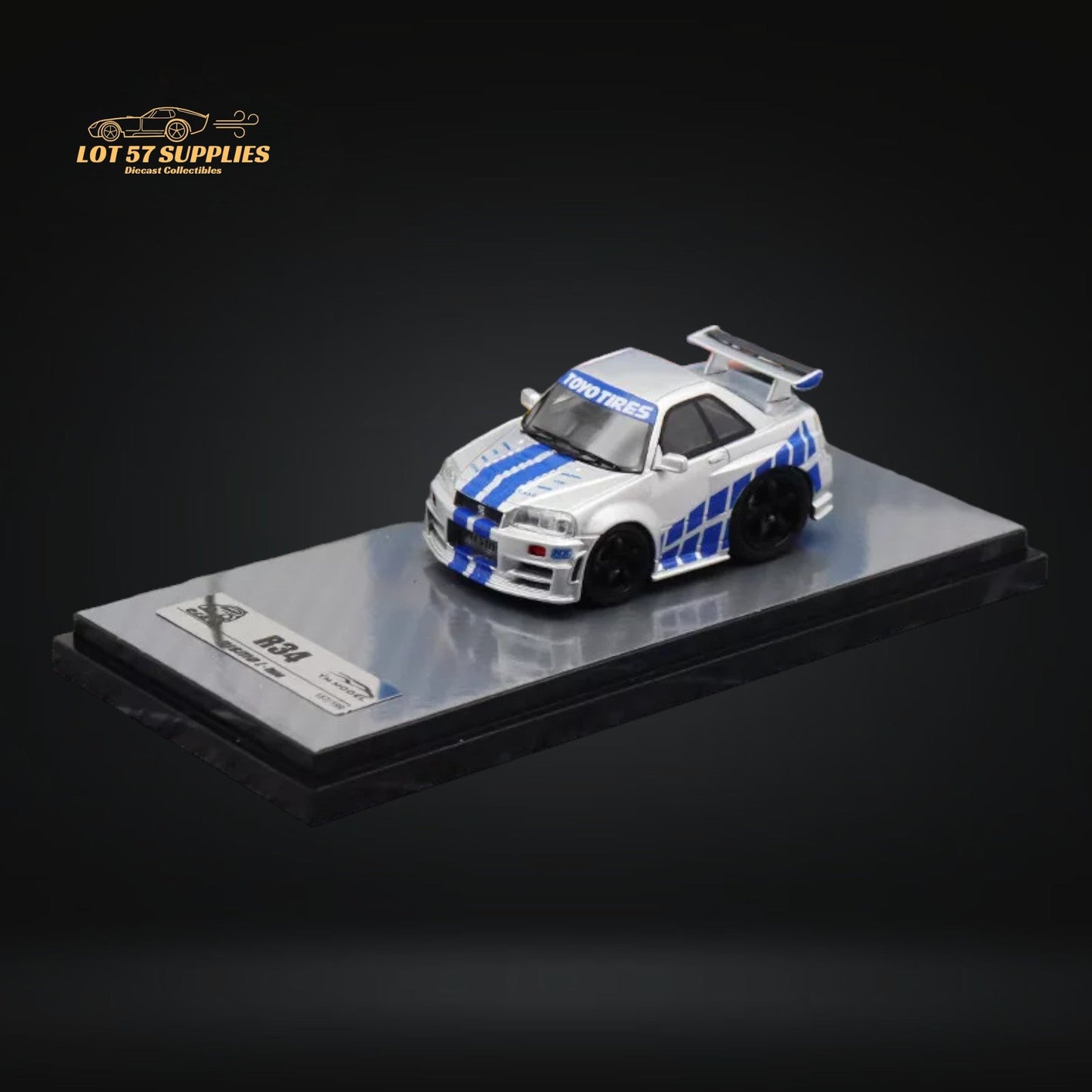 Nissan YM Model Skyline R34 diecast car in silver blue with F&F livery, 1:64 scale, from Lot57Supplies Diecast Shop.