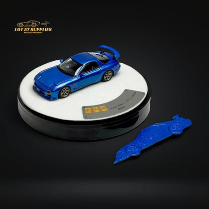 Metallic blue Mazda RX-7 FD3S diecast model in 1:64 scale by Lot57Supplies Diecast Shop, detailed miniature car.
