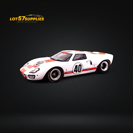 Diecast Ford GT40 MK1 model in Gulf livery, 1:64 scale, featuring detailed blue and orange Gulf racing stripes.