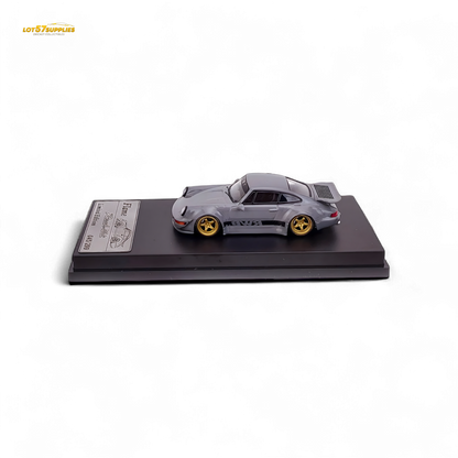 Cement gray Porsche 964 RWB Whale Tail diecast model car in 1:64 scale by Lot57Supplies Diecast Shop, detailed and realistic.