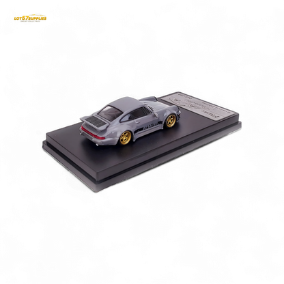 Cement gray Porsche 964 RWB Whale Tale diecast car model, 1:64 scale, featuring detailed design and realistic features.