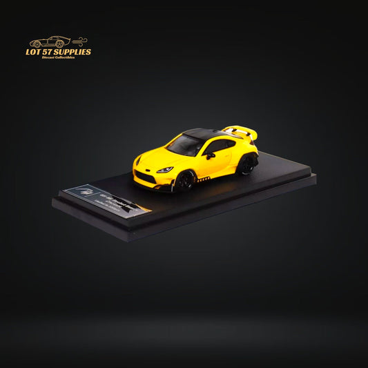 Yellow Toyota GR86 Pandem 2nd Gen diecast model, 1:64 scale, from Lot57Supplies Diecast Shop, detailed miniature car.