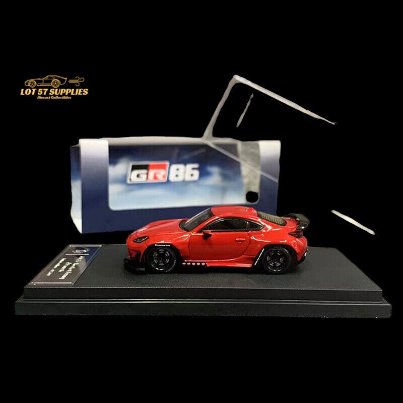 Red Toyota GR86 diecast model by Fuji with Rocket Bunny Pandem body kit, 1:64 scale, detailed miniature car.