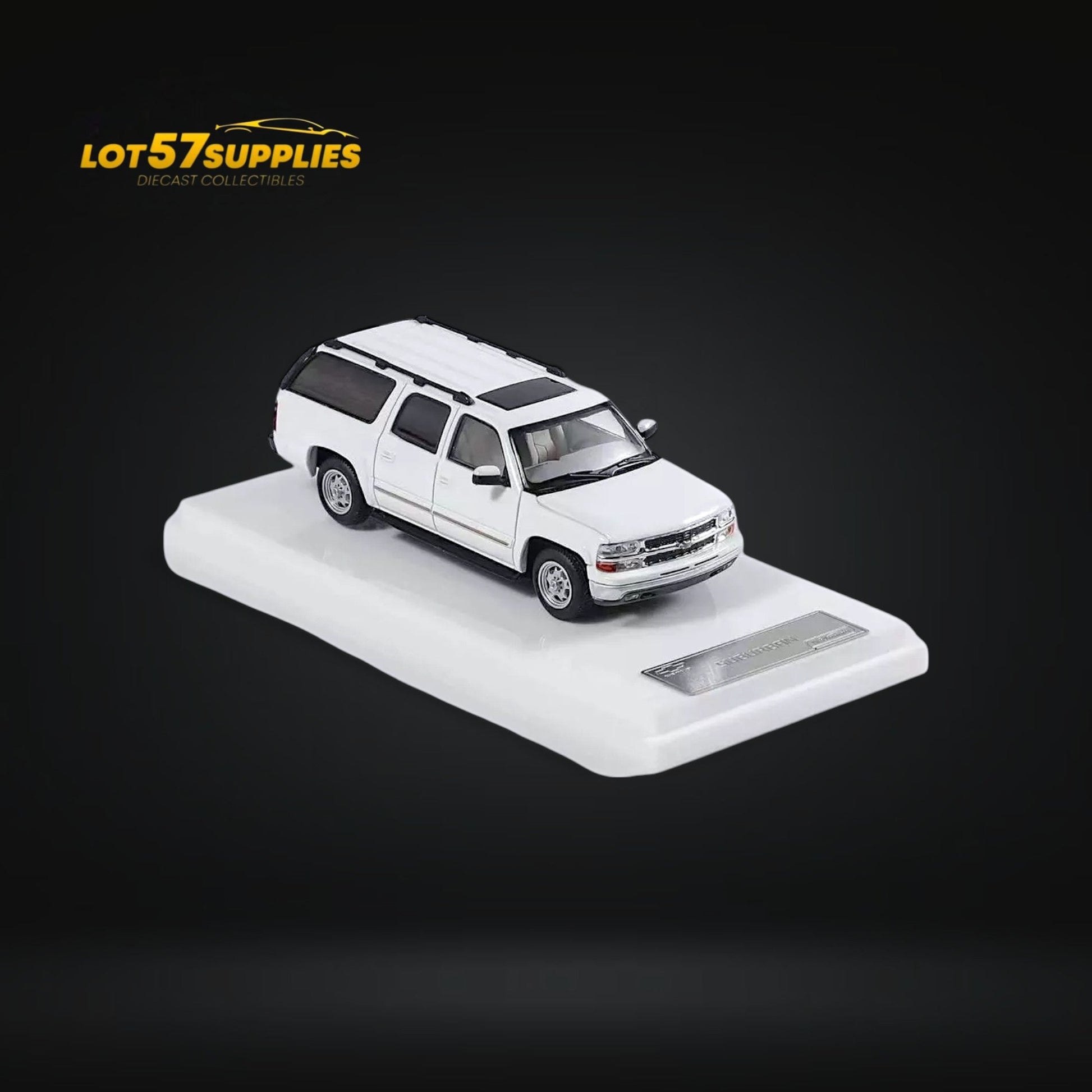 White Chevrolet Suburban miniature diecast model in 1:64 scale by Lot57Supplies Diecast Shop, detailed automotive collectible.