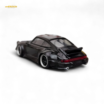 Gloss black Porsche 964 RWB Ducktail diecast model in 1:64 scale with detailed features and realistic finish.