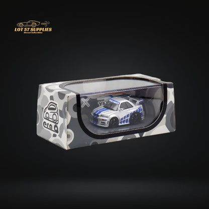 Silver blue Nissan Skyline R34 diecast model with F&F livery in 1:64 scale by Lot57Supplies Diecast Shop.